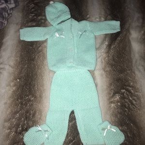 Crochet baby outfit.